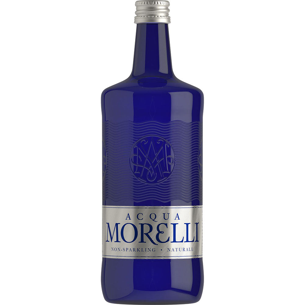 Eine blaue Glas-Royale Flasche von Acqua Morelli Naturale 0,75L (MEHRWEG) mit silbernem Schraubverschluss und Etikett, die die raffinierte Eleganz dieses Premium-Mineralwassers unterstreicht. Erhältlich in einer 12er-Packung von Acqua Morelli.