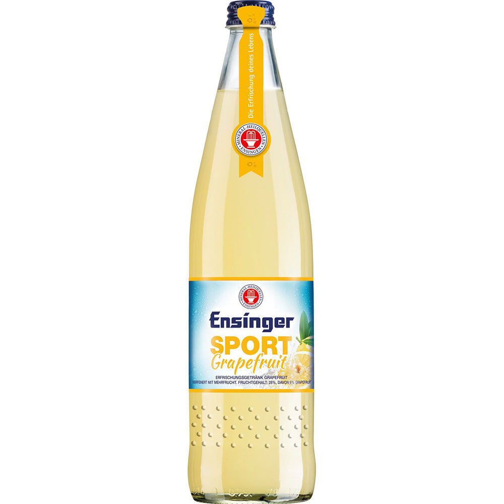 Eine Flasche Ensinger Sport Grapefruit 0,75 l (MEHRWEG) mit blauem Etikett und gelbem Verschluss enthält Mineralwasser mit Magnesium und Calcium und wird im 12er-Pack geliefert.