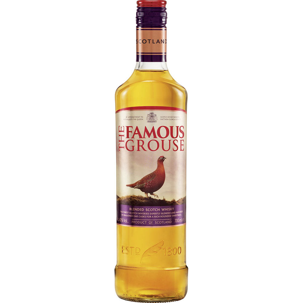 Eine 0,7-Liter-Flasche The Famous Grouse Finest Blended Scotch Whisky (40%) zeigt ein rotes Moorhuhn auf dem Etikett und ist für seinen weichen, ausgewogenen Geschmack bekannt.