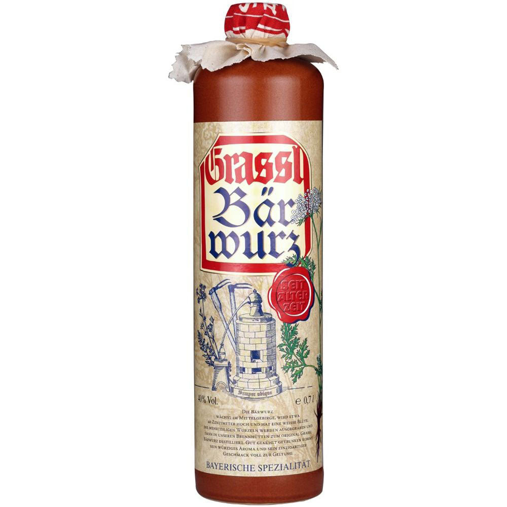 Eine 0,7-Liter-Flasche Grassl Bärwurz 40% von Grassl, ein klassischer bayerischer Kräuterlikör mit dekorativem Etikett und stoffumwickeltem Verschluss.