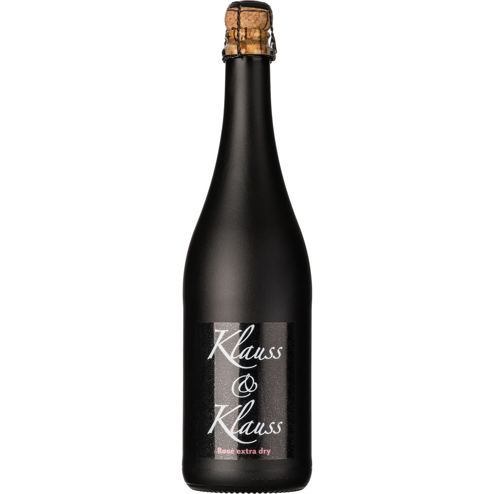 Eine 0,75-Liter-Flasche Klauss & Klauss Black Edition Rosé Extra Dry Sekt mit einem Korkenverschluss.