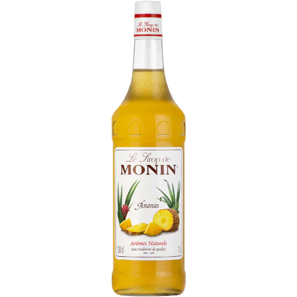 Der 1-Liter Monin Ananas Sirup hat ein Etikett mit Ananas und Blättern, ideal, um tropischen Cocktails einen süßen Geschmack zu verleihen.