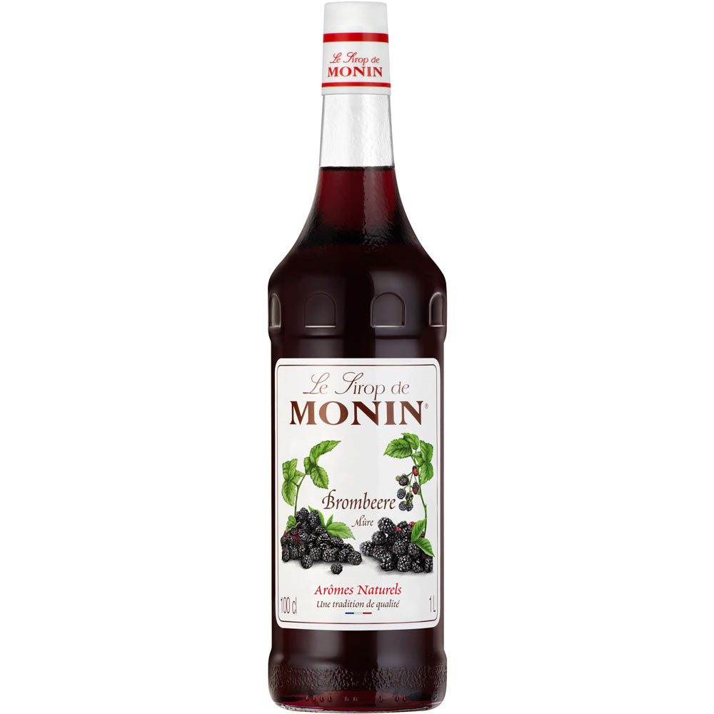 Die 1-Liter-Flasche Monin Brombeere Sirup hat ein Etikett mit Brombeeren und grünen Blättern, ideal zum Mixen leckerer veganer Getränke.