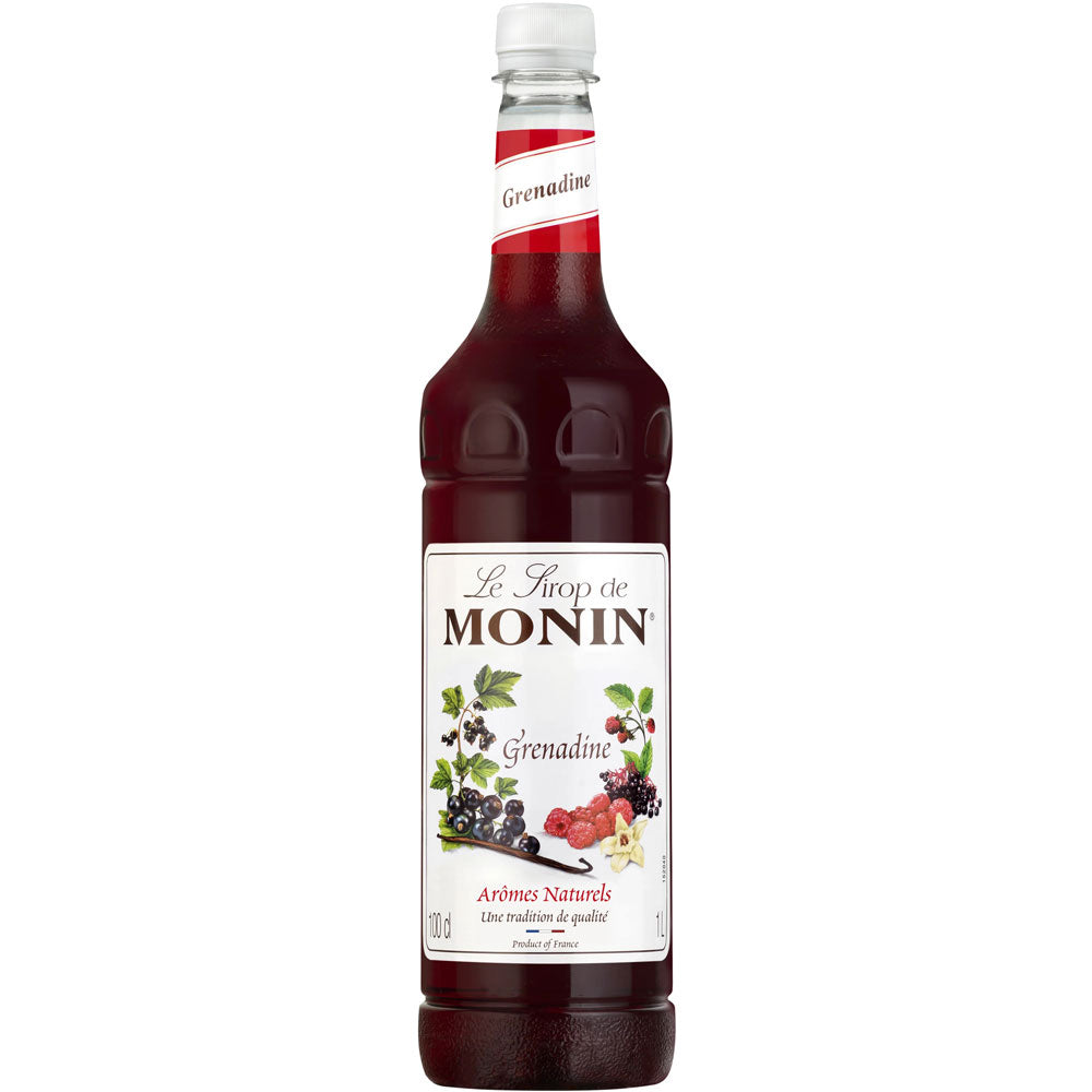 Die 1-Liter-Flasche Monin Grenadine Sirup hat ein weißes Etikett mit Beerenmotiven und roter Flüssigkeit, perfekt, um Cocktails mit Beerenextrakt-Geschmack zu verfeinern.