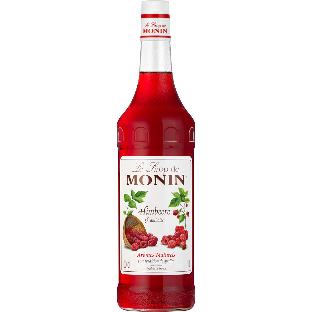 Eine 1-Liter-Flasche Monin Himbeere Sirup von Monin, mit leuchtend rotem Himbeersirup und einem Etikett mit frischen Himbeeren.