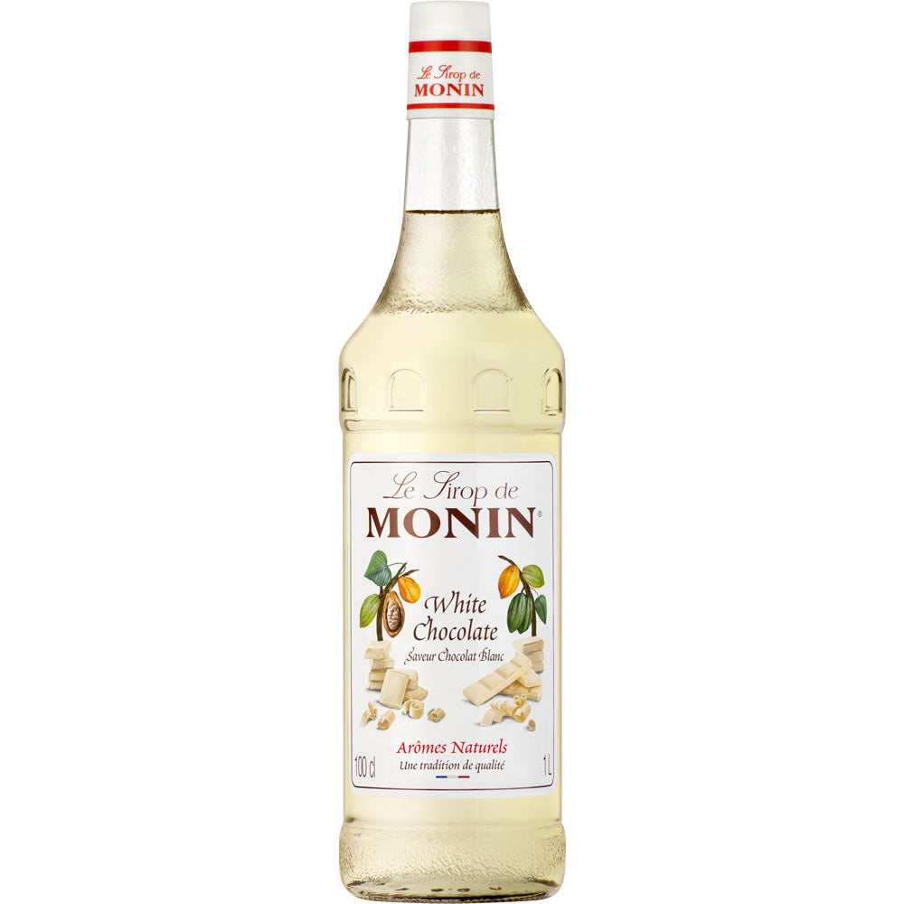 Monin Weiße Schokolade Sirup 1 Liter - veganer Sirup von Monin mit weißem Etikett und weißen Schokostückchen, ideal für Kaffee, Desserts oder Drinks.
