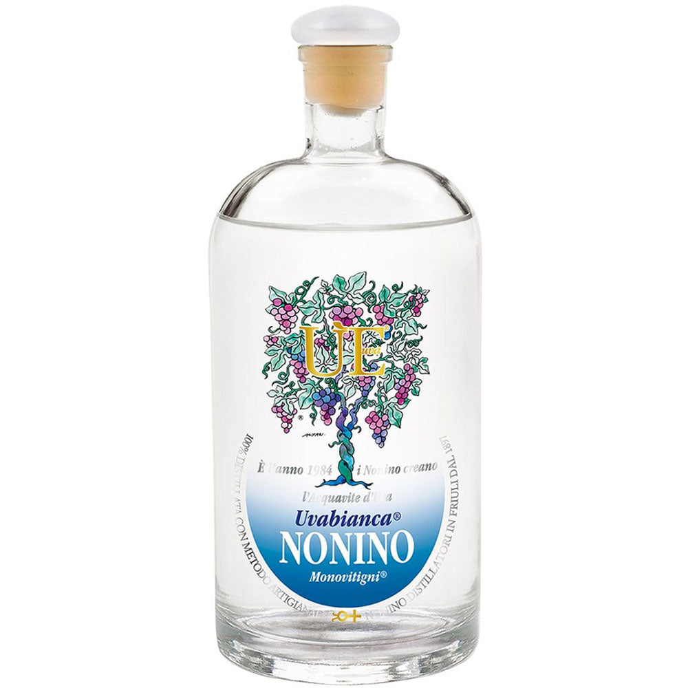 Klarglasflasche von Nonino Distillatori Uvabianca Traubenbrand 38% (0,7L) mit weißem Verschluss und einer bunten Weinrebenillustration auf dem Etikett.
