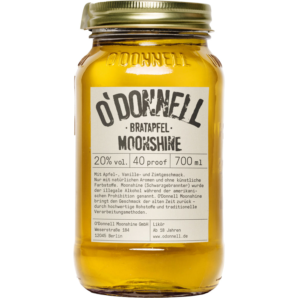 Ein 0,7-Liter-Glas O'Donnell Moonshine Bratapfel 20% mit goldener Flüssigkeit und weißem Etikett - ein veganer Likör, inspiriert von den Apfel-Zimt-Aromen von O'Donnell Moonshine.