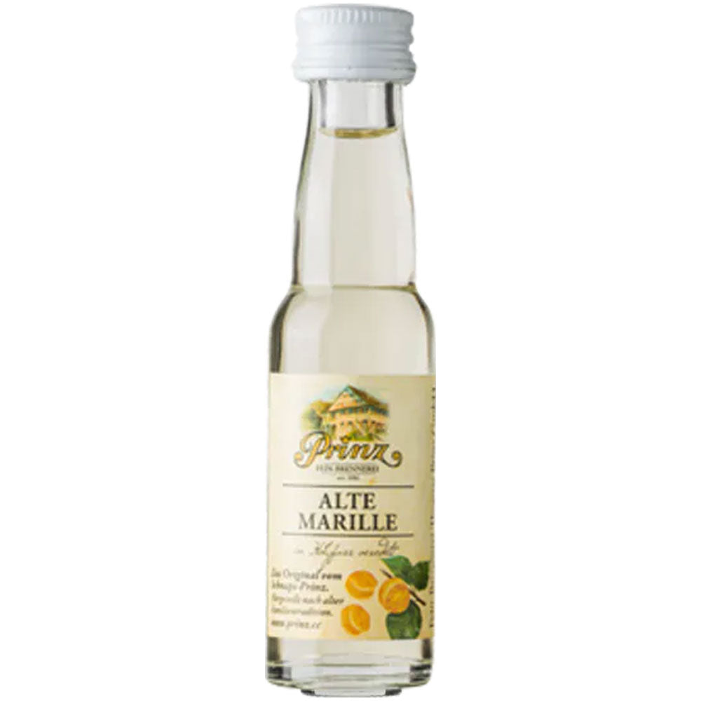 Eine Klarglasflasche der Feinbrennerei Thomas Prinz Alte Marille 41% Likör (0,02L) mit weißem Verschluss und Fruchtdarstellung auf dem Etikett.