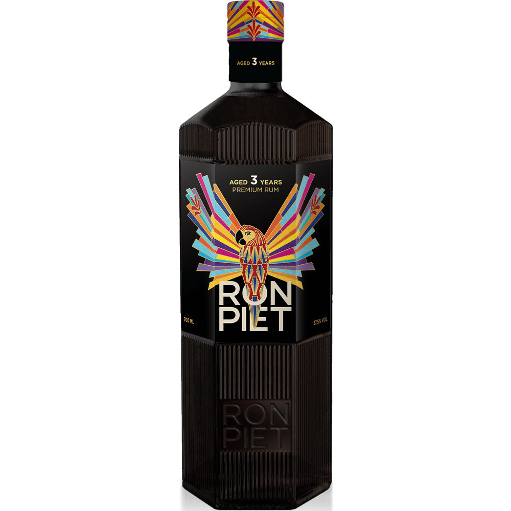 Ron Piet Premium Rum 3 Jahre 37,5% (0,7L) in einer schwarzen Flasche, mit einem lebendigen geometrischen Vogel-Etikett.