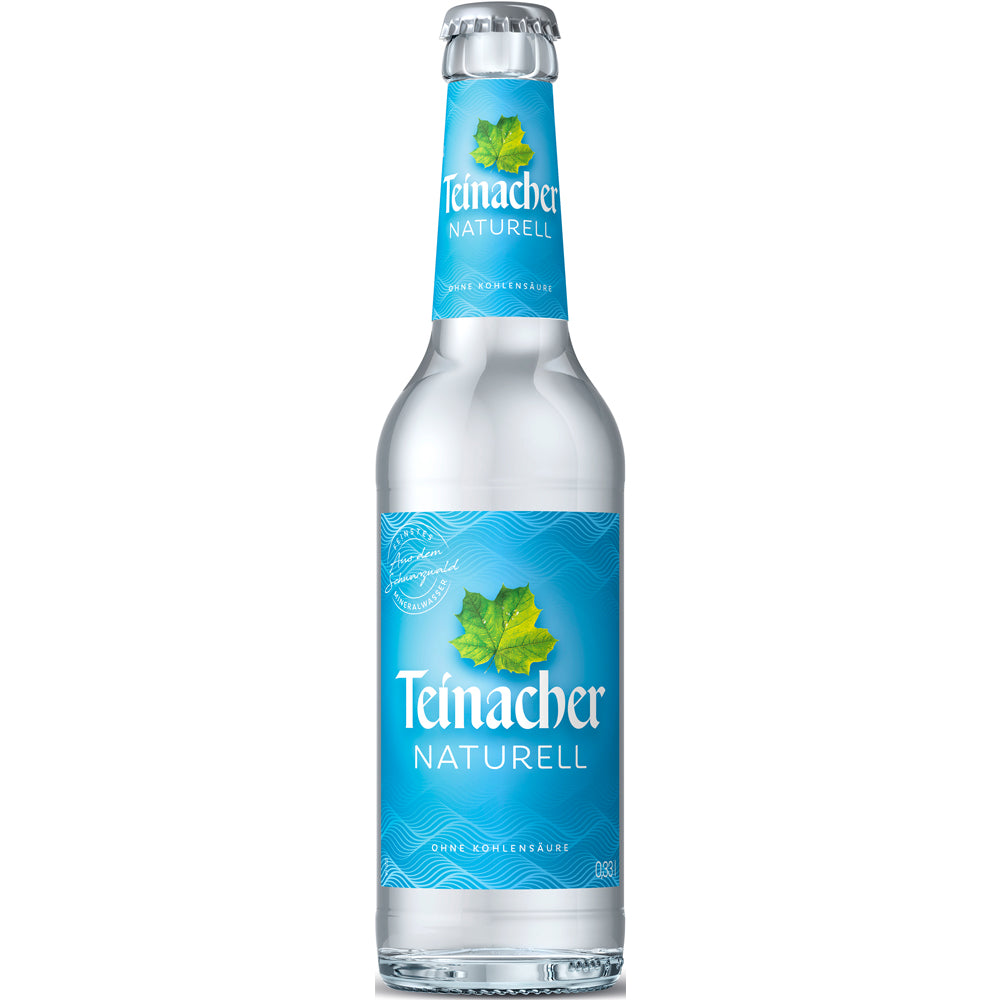 Klare 0,33-Liter-Glasflasche von Teinacher Mineralwasser Naturell (MEHRWEG) mit blauem Etikett und grünem Blattmotiv; erhältlich im 12er-Pack.
