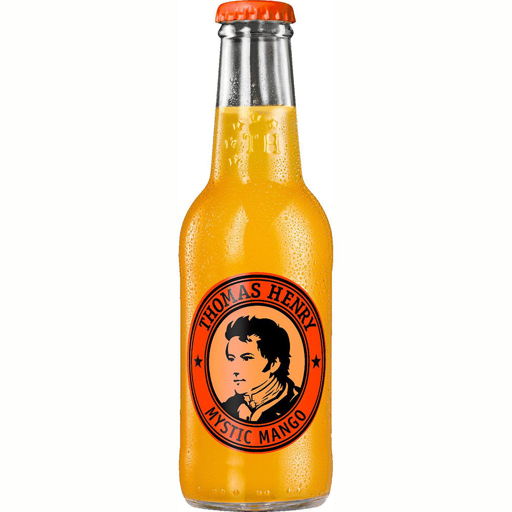 Eine gekühlte Flasche Thomas Henry Mystic Mango Limonade 0,2L (Mehrweg), mit dem charakteristischen orangefarbenen Etikett und den Kondensationstropfen.