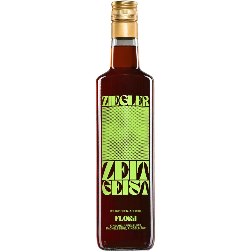 Eine 0,7L Flasche Ziegler Zeitgeist Wildwiesen-Aperitif Flora (15% vol) von Ziegler, ein deutscher Aperitif mit grün-schwarzem Etikett und goldenem Verschluss.