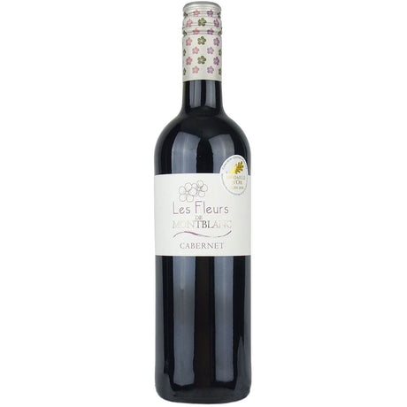 Eine Flasche Les Vignerons de Montblanc Fleurs de Montblanc Cabernet Sauvignon 2024 mit weißem Etikett und floralem Verschluss, der die Eleganz des Les Vignerons de Montblanc und den Charakter des Rotweins aus dem Languedoc unterstreicht.