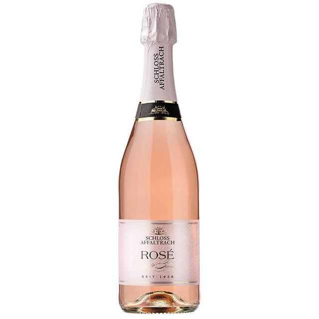 Eine 0,75-Liter-Flasche Schloss Affaltrach Sekt Rosé Trocken aus Württemberg mit einem hellrosa Etikett und einem mit Folie umwickelten Hals.