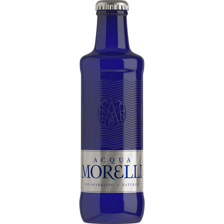 Acqua Morelli Naturale 24x 0,25L (MEHRWEG) von Acqua Morelli besteht aus einer blauen Glasflasche mit Royale-Design, silbernem Etikett und Verschluss.
