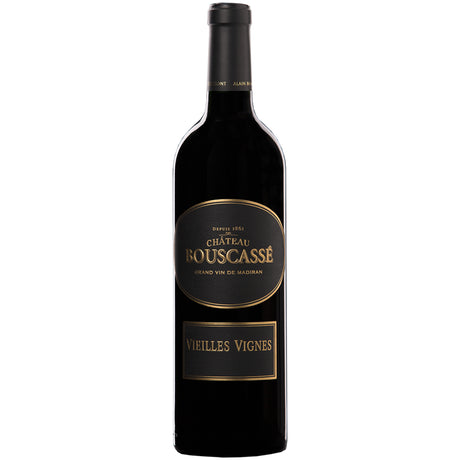 Eine Flasche Alain Brumont Château Bouscassé Vieilles Vignes Madiran AOC 2017 Rotwein mit einem markanten schwarz-goldenen Etikett mit der Aufschrift „Vieilles Vignes“, der den renommierten Madiran-Jahrgang 2017 präsentiert, der von Alain Brumont hauptsächlich aus Tannat-Trauben gekeltert wurde.