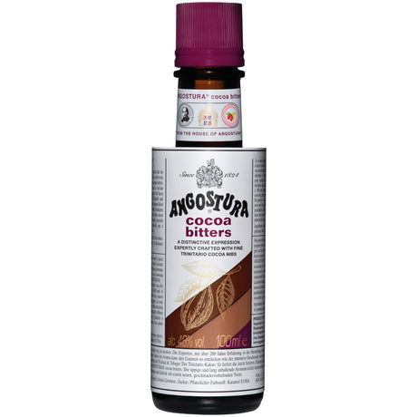 Eine 0,1-Liter-Flasche Angostura Cocoa Bitter 49% mit kastanienbrauner Kappe und Kakaobohnen-Etikett, hergestellt mit reichhaltigem Trinitario-Kakao für ein einzigartiges Cocktail-Erlebnis.