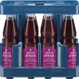 Zwölf 0,5-Liter-Flaschen Aqua Römer Quelle Schwarze Johannisbeere Mineralwasser (MEHRWEG) in einer blauen PET-Kiste.