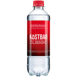 Eine klare PET-Flasche Bad Dürrheimer Kostbar Mineralwasser Classic (20x0,5L) mit rotem Etikett und Verschluss aus dem Schwarzwald.