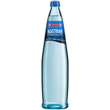 Eine hohe, klare Glasflasche Bad Dürrheimer Kostbar Mineralwasser Medium Exklusiv (12x 0,75L Mehrweg) mit blauem Etikett, aus dem Schwarzwald stammend und als Bio-Mineralwasser zertifiziert.