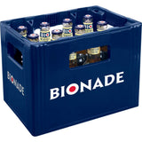 Eine blaue Bionade-Kiste enthält mehrere Bionade Naturtrübe Zitrone BIO 0,33L Glasflaschen mit sichtbaren "Bio"-Etiketten auf den Deckeln (12x Mehrweg).