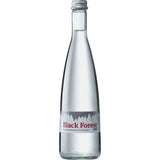 Black Forest Still Gourmet 12x 0,5L (MEHRWEG) von Black Forest: klare Glasflaschen mit silbernem Verschluss und Etikett mit Waldmotiv, das den ausgewogenen pH-Wert für pure Erfrischung betont.