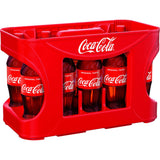 Zwölf erfrischende 0,5-Liter-PET-Flaschen mit Coca-Cola-Originalgeschmack in einer Markenpackung, von Coca-Cola.