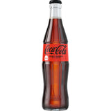 Coca-Cola Zero Sugar 24x 0,33L (MEHRWEG): Kalorienreduzierte Cola im Mehrweg-Glasflaschenpack mit rotem Label und schwarzem Deckel - die zuckerfreie Erfrischung von Coca-Cola.