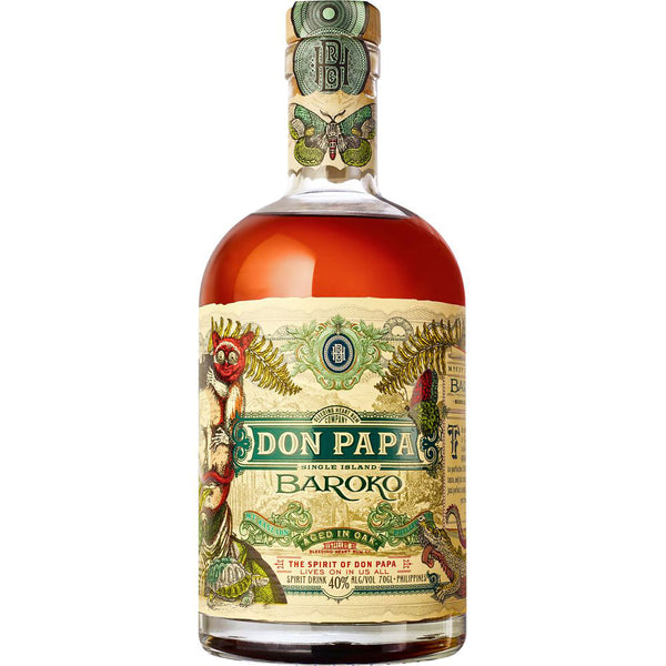 Eine 0,7-Liter-Flasche Don Papa Baroko Rum (40%) von Don Papa Rum mit einem detaillierten, farbenfrohen Etikett mit Tieren und üppigem Blattwerk.