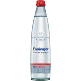 Eine Klarglasflasche Ensinger Gourmet BIO Classic 0,5L (MEHRWEG) Mineralwasser mit rotem Verschluss, Premiumqualität von Ensinger, Deutschland.