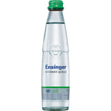 Eine Klarglasflasche Ensinger Gourmet BIO Still, 0,25 l (Mehrweg), mit grünem Verschluss und blauem Etikettentext.