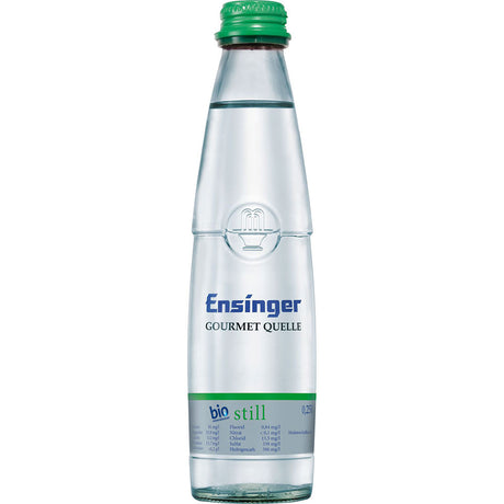 Eine Klarglasflasche Ensinger Gourmet BIO Still, 0,25 l (Mehrweg), mit grünem Verschluss und blauem Etikettentext.