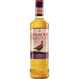 Eine 0,7-Liter-Flasche The Famous Grouse Finest Blended Scotch Whisky (40%) zeigt ein rotes Moorhuhn auf dem Etikett und ist für seinen weichen, ausgewogenen Geschmack bekannt.