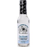 Eine klare 0,15-Liter-Flasche Fee Brothers Fee Foam Eiweißersatz von Fee Brothers mit einem schwarz-silbernen Verschluss - ideal, um Cocktailschaum ohne Eischnee zu Ihren geschüttelten Drinks hinzuzufügen.