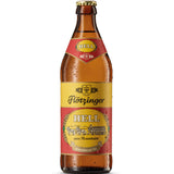 Eine Flötzinger Hell 20x 0,5 Liter (MEHRWEG) Bierflasche, gebrandet von Flötzinger mit rotem und gelbem Etikett und überzogen mit Kondenswasser, unterstreicht die bayerische Brautradition - ein knackiges Helles Lagerbier für jeden Anlass.