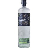 Eine klare 0,7-Liter-Flasche Friedrichs Gin Bartenders Choice (40%) mit einem dunkelblauen Etikett und geprägten botanischen Motiven unterstreicht die Handwerkskunst von Friedrichs Gin.