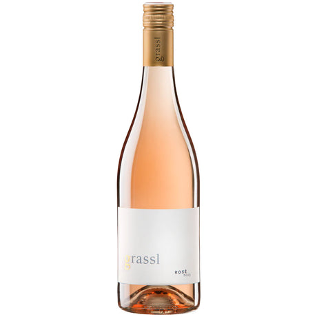 Eine Flasche „Grassl Rosé Cuvée Carnuntum DAC 2025“ vom Weingut Philipp Grassl, hergestellt aus Zweigelt- und Blaufränkisch-Trauben aus der Carnuntum-DAC-Region, mit goldenem Verschluss und weißem Etikett, vor einem schlichten weißen Hintergrund.