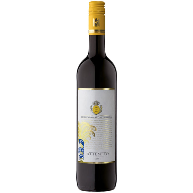 Eine Flasche „Herzog von Württemberg Attempto Rotwein-Cuvée trocken“ mit gelbem Verschluss und weißem Etikett präsentiert diese erlesene trockene Rotwein-Cuvée, die vom Herzog von Württemberg aus den Rebsorten Lemberger, Spätburgunder und Syrah gekeltert wurde.