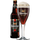 Eine Flasche und ein hohes Glas Köstritzer Schwarzbier 20x 0,5L (MEHRWEG), dunkles deutsches Bier mit reichlich Schaumkrone.
