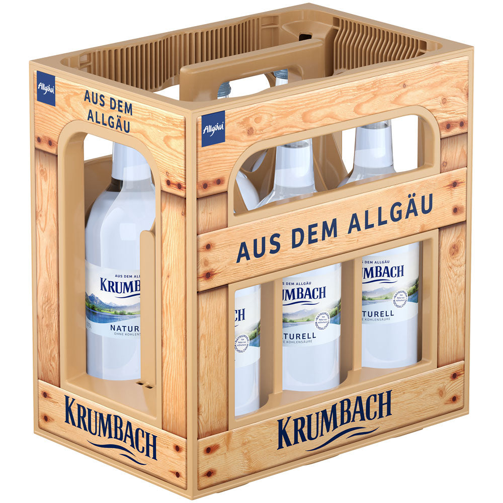 Eine Holzkiste mit der Aufschrift Krumbach enthält sechs 0,75-l-Flaschen Krumbach Mineralwasser Naturell (MEHRWEG), ein stilles, natriumarmes Mineralwasser.