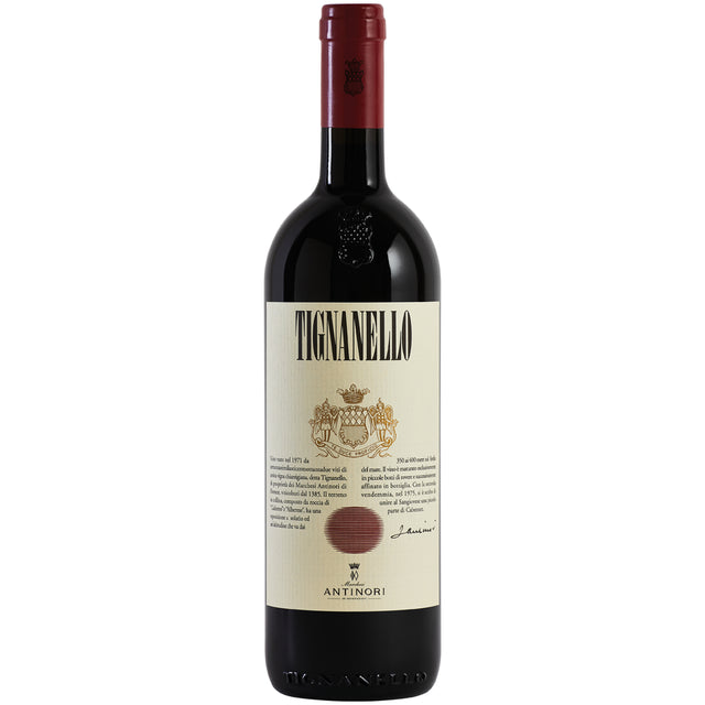 Eine Flasche Marchesi Antinori Tignanello Toscana IGT 2023 – ein renommierter Supertuscan-Rotwein von Antinori – mit cremefarbenem Etikett und roter Folie am Flaschenhals.