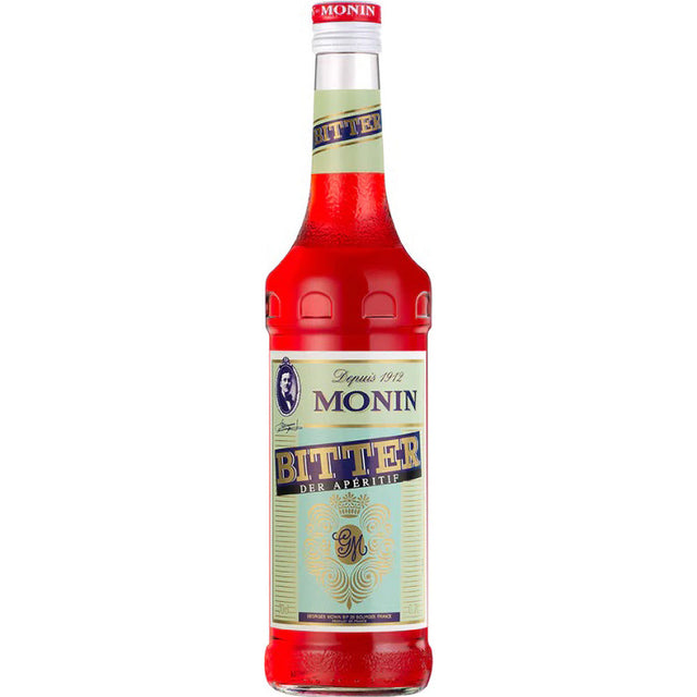 Eine 1-Liter-Flasche Monin Bitter Aperitif mit einer roten, alkoholfreien Flüssigkeit und einem hellgrünen Etikett.