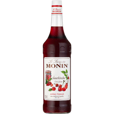 Monin Sauerkirsche Sirup 1 Liter von Monin kommt in einer Flasche mit rotem Etikett und Kirschenmotiven. Dieser vegane Sirup verleiht Getränken und Desserts einen spritzigen Kirschgeschmack.