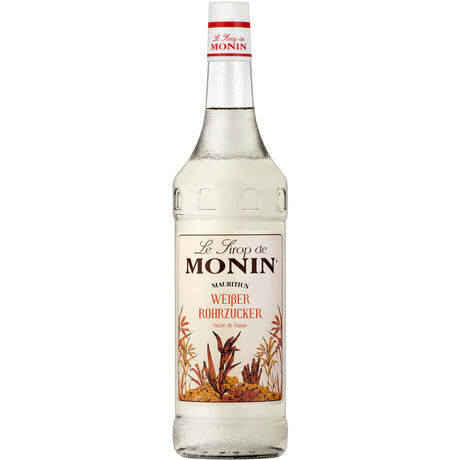 Eine 1-Liter-Flasche Monin Weißer Rohrzucker Sirup mit weißem Etikett und botanischem Design - ideal zum Süßen von Cocktails.