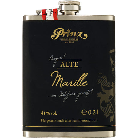 Die Feinbrennerei Thomas Prinz "Prinz Alte Marille im Edelstahl-Flachmann" ist eine schwarze 0,2-Liter-Metallflasche mit goldener Aufschrift und rotem Siegel, die hochwertigen Marillenschnaps Obstbrand mit 41 Volumenprozent Alkohol enthält.