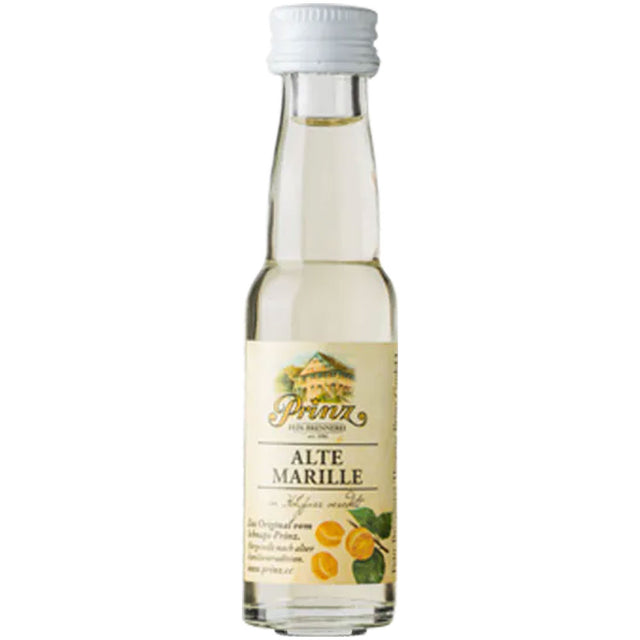 Eine Klarglasflasche der Feinbrennerei Thomas Prinz Alte Marille 41% Likör (0,02L) mit weißem Verschluss und Fruchtdarstellung auf dem Etikett.
