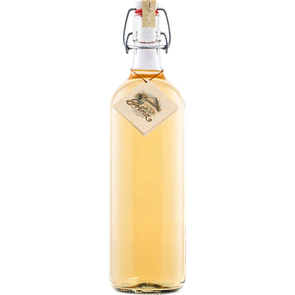 Eine Klarglasflasche mit Bügelverschluss, gefüllt mit hellgelber Flüssigkeit und einem Halsetikett, enthält die Feinbrennerei Thomas Prinz Alte Williams-Christ-Birne 41% 1 Liter - ein raffinierter Schnaps aus reifen Birnen.