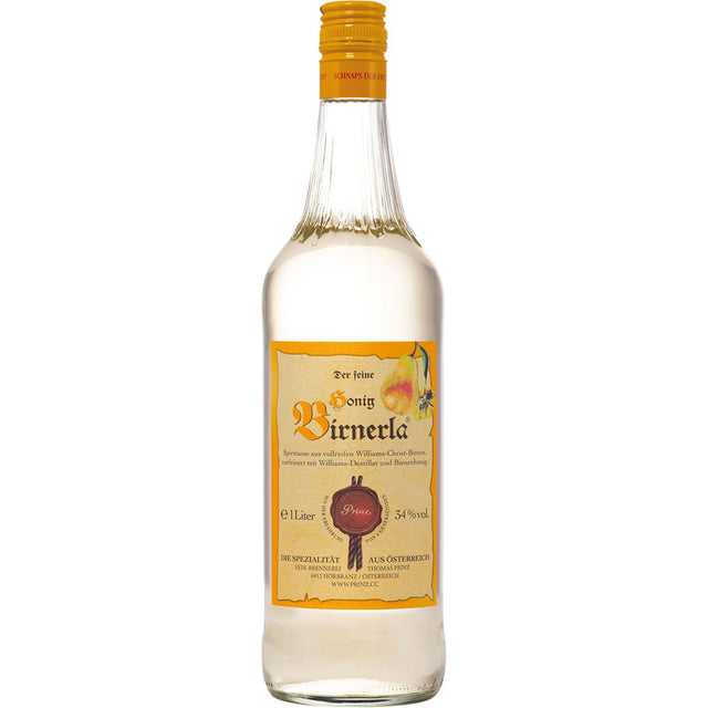 Eine Klarglasflasche Prinz Honig-Birnerla 34% von der Feinbrennerei Thomas Prinz, die mit einem Etikett versehen ist.