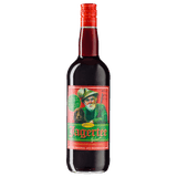 Eine 1L Flasche Prinz Jagertee Klassik 40% von der Feinbrennerei Thomas Prinz, mit einem grün-roten Etikett, auf dem ein Mann mit Hut und ein Hund abgebildet sind, die authentische österreichische Jagertee Tradition verkörpern.